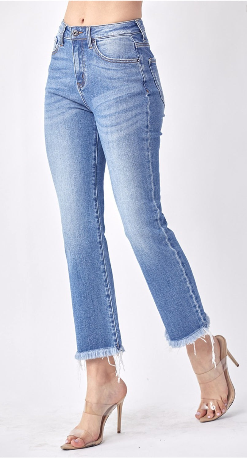 Risen mid rise raw hem jeans