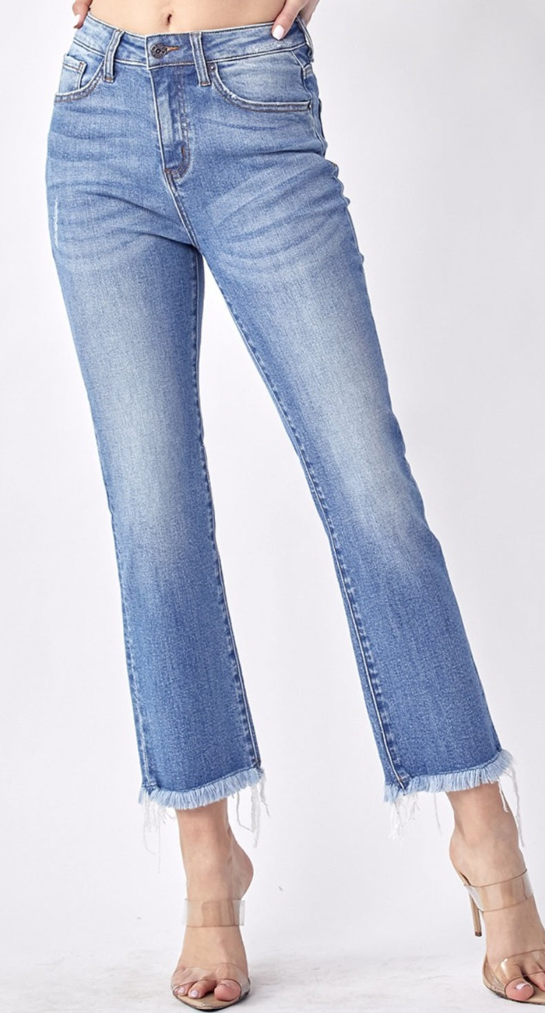 Risen mid rise raw hem jeans